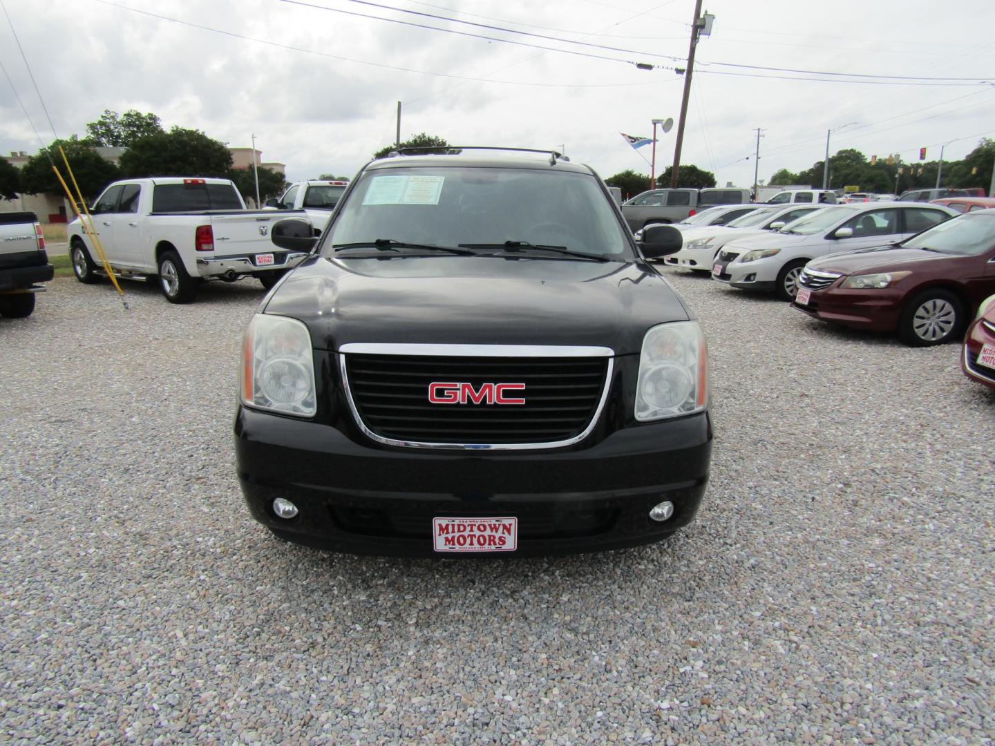 2012 Black /Gray GMC Yukon SLE1 2WD (1GKS1AE03CR) with an 5.3L V8 OHV 16V FFV engine, Automatic transmission, located at 15016 S Hwy 231, Midland City, AL, 36350, (334) 983-3001, 31.306210, -85.495277 - Photo#1